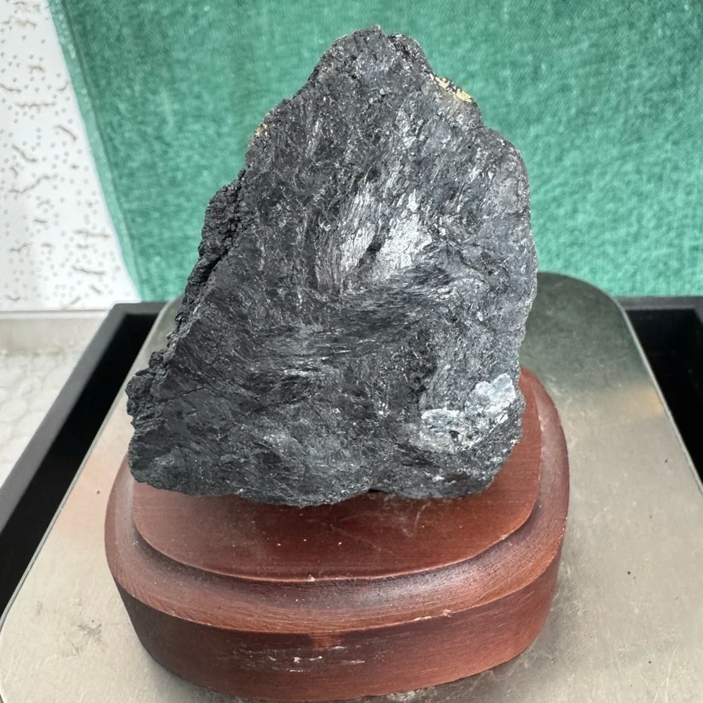 Black tourmaline on wooden stand base